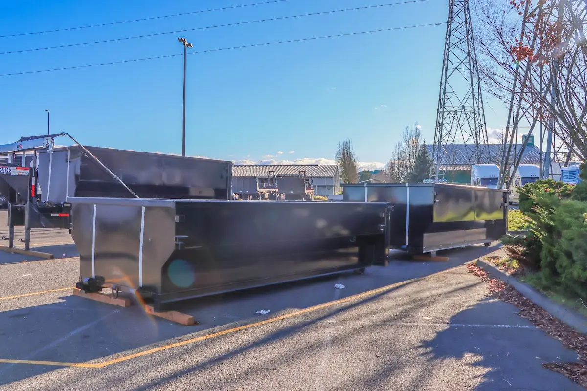 Roll-off dumpster ready for waste disposal at job site for 15 Yard Dumpster Rental in Northampton